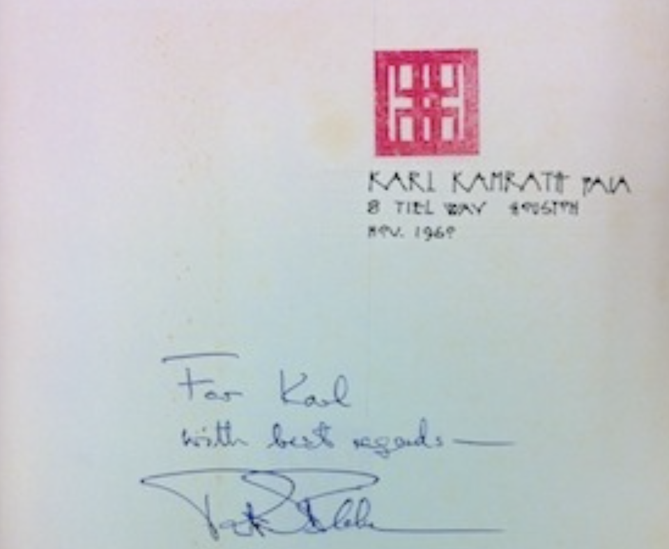 The image is of one side of a post card.  The message "For Karl with best regards" is handwritten on the card.K