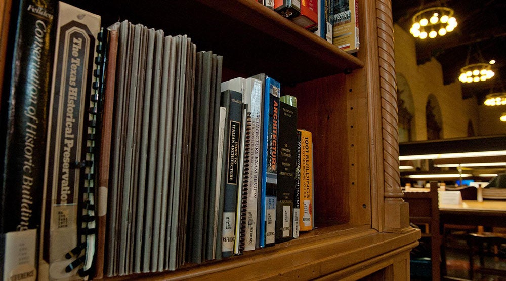 books on a wooden shelf