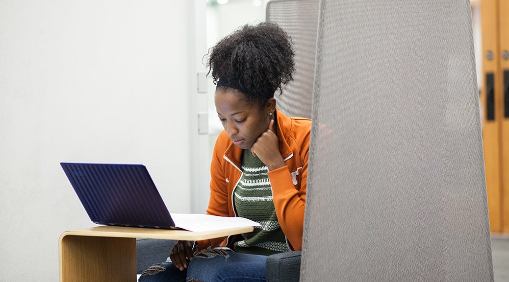 Person looking at laptop