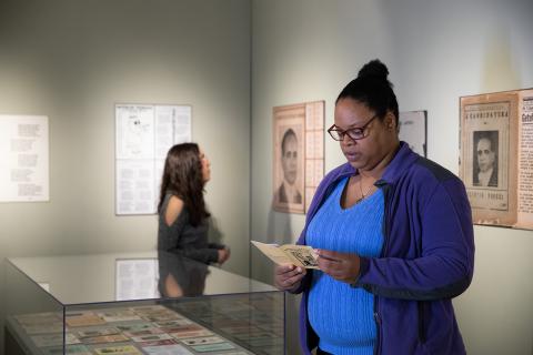 Person evaluating a printed booklet