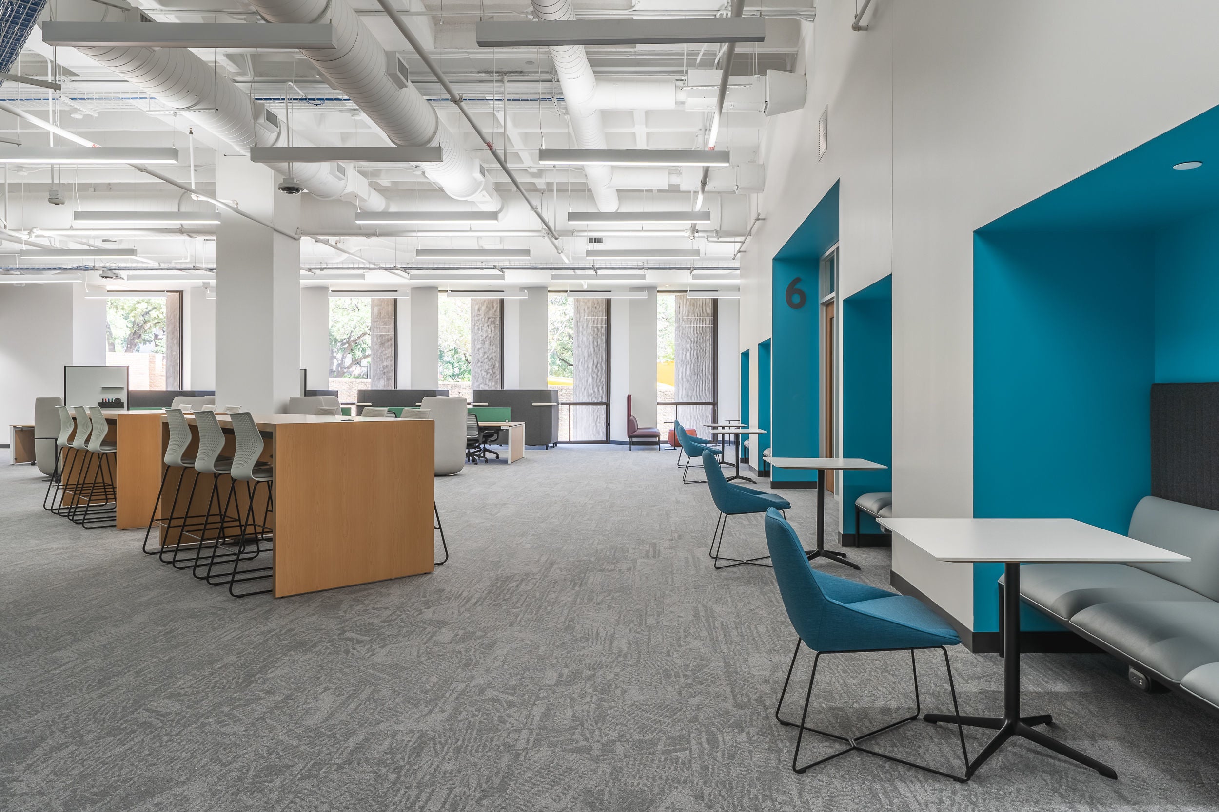 A row of study tables with other built in lounging