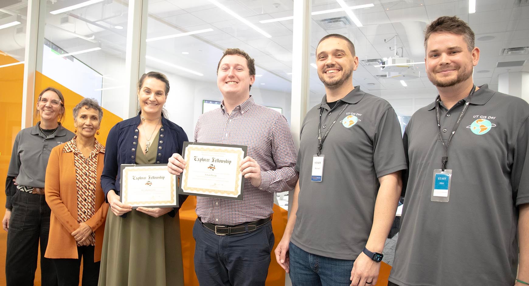 GIS Staff and fellowship winners standing in front of computer lab