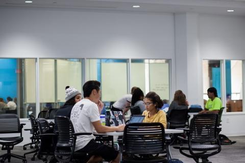 students sitting in ergonomic chairs